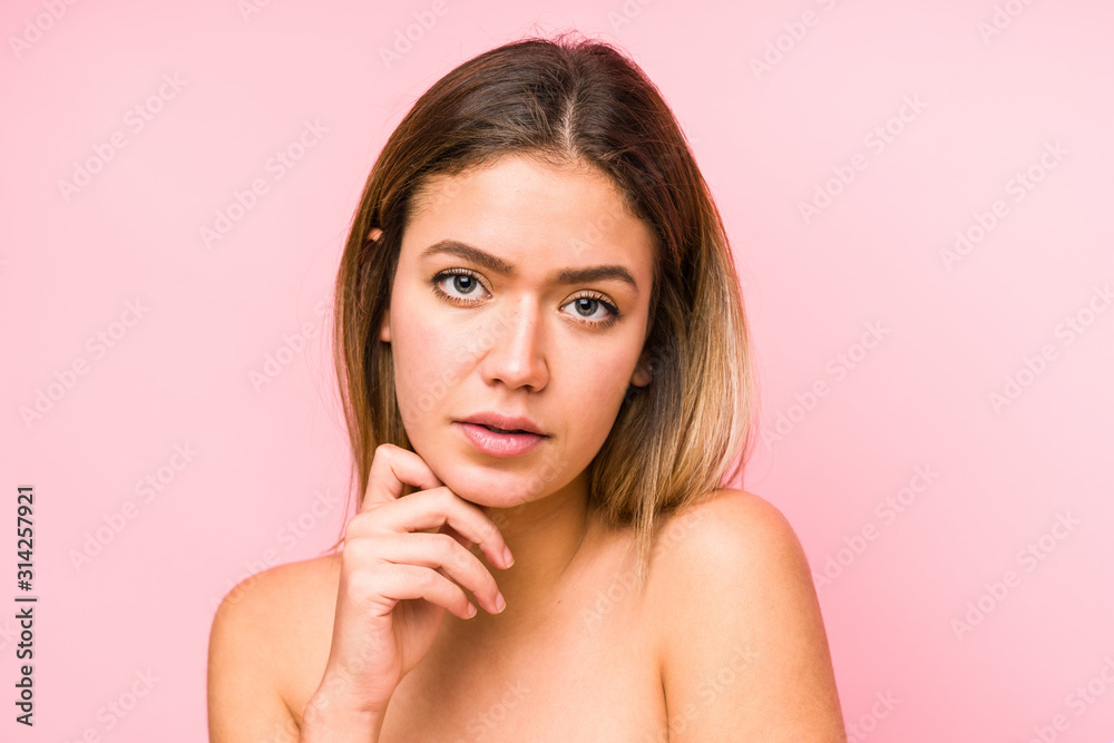 Young caucasian woman face close up isolated Young caucasian woman face close up isolated