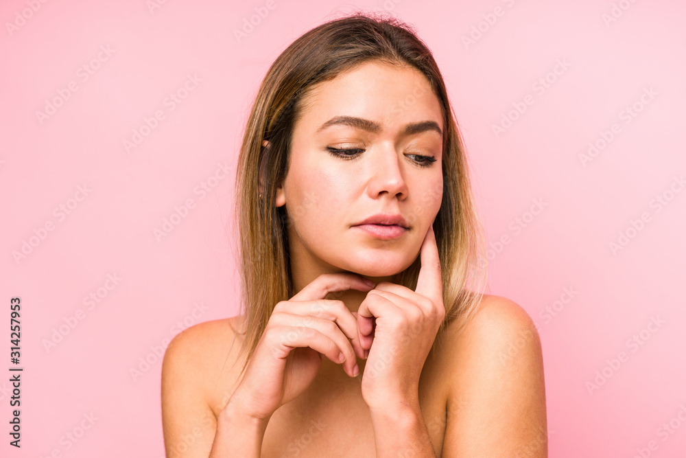 Young caucasian woman face close up isolated Young caucasian woman face close up isolated