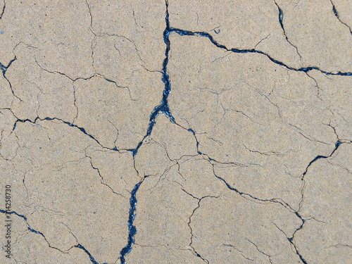 Close up Cracked concrete floor background.