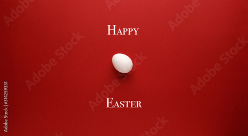 Canvas Print White easter egg with happy easter word, holiday concept