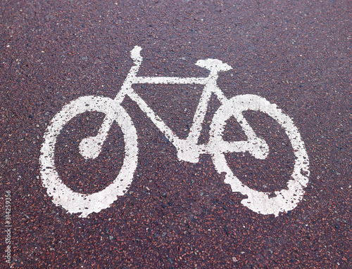 Sign Bicycle path on the pavement with white paint