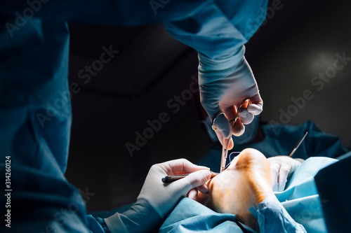 Surgeon operating in the hospital. Healthcare concept