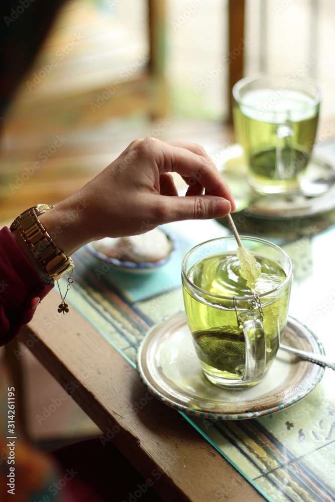 drinking green tea in a cafe