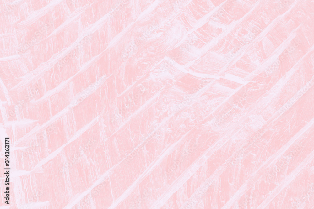 Fototapeta premium Pale pink coral color background. Wooden texture with diagonal lines. Wooden cracked texture