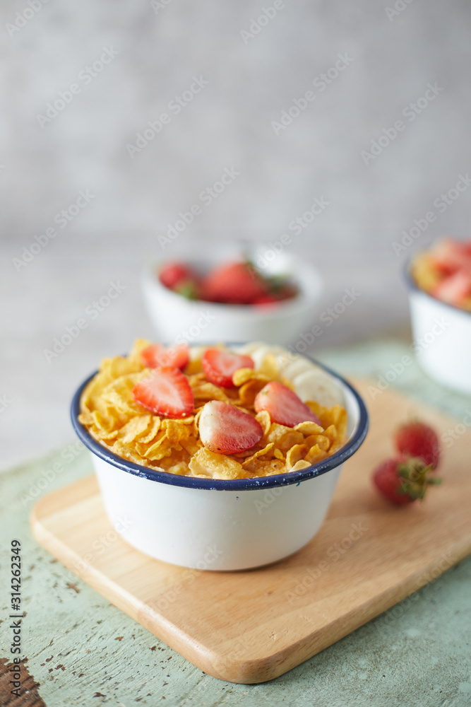 Bowl with cornflakes on background.. Bowl with cornflakes on background..