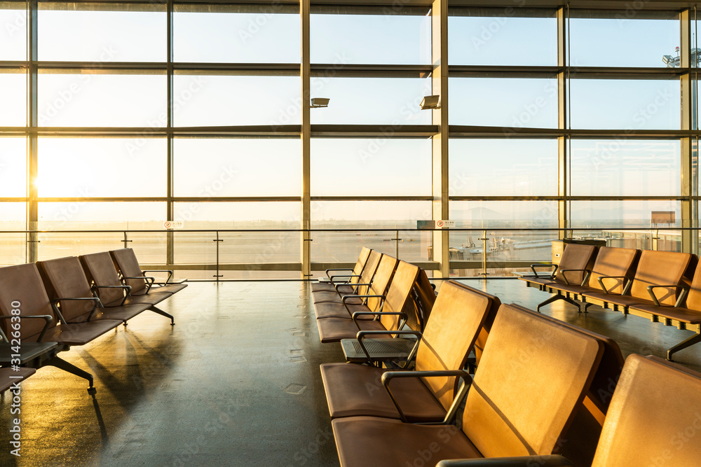 Chairs in modern airport terminal
