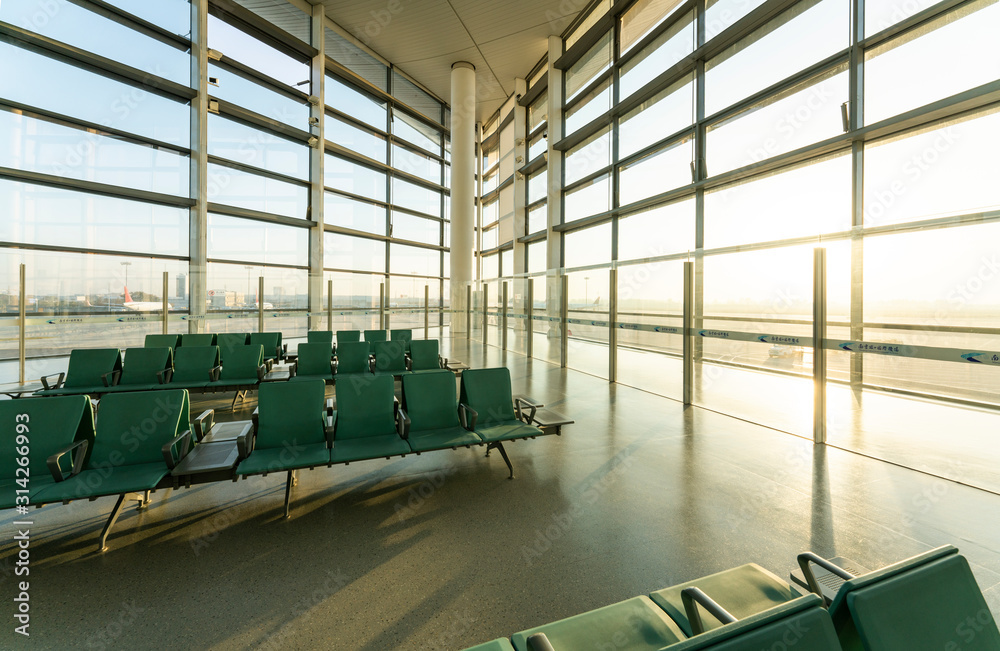 Chairs in modern airport terminal