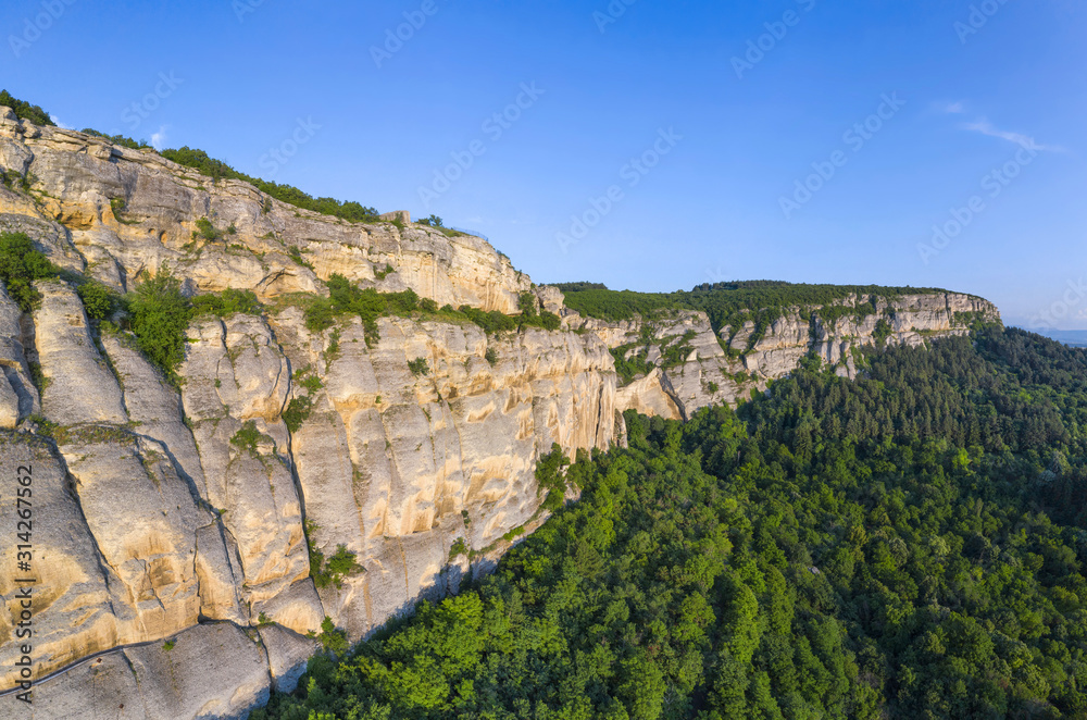 The limestone Madara cliff - a place where the Madara Rider was carved, dated in early 8th century, during the reign of Khan Tervel - the king of Bulgarians.