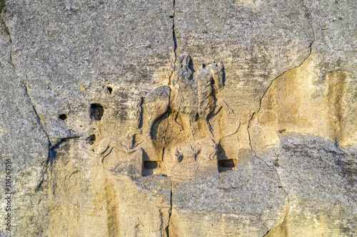 The Madara Rider - an early medieval rock relief carved on limestone cliff near Madara village, dated in early 8th century,  during the reign of Khan Tervel - the king of Bulgarians. photo