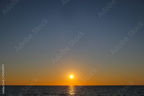 Perfect burning sunset sea horizon in cilento south of italy, nature backgrounds © paolo