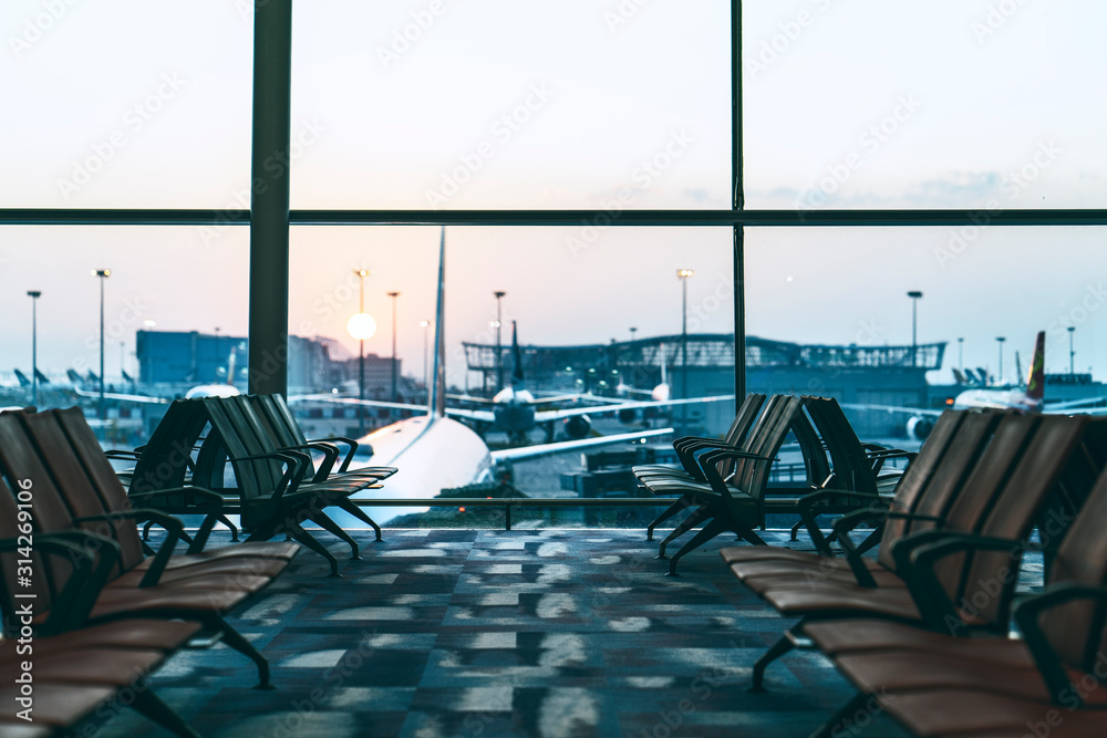 Chairs in modern airport terminal