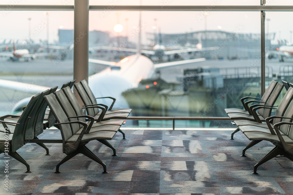Chairs in modern airport terminal