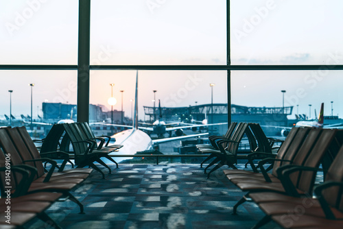 Obraz na płótnie Chairs in modern airport terminal w salonie