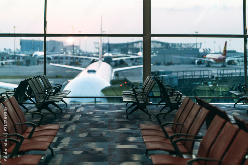 Chairs in modern airport terminal