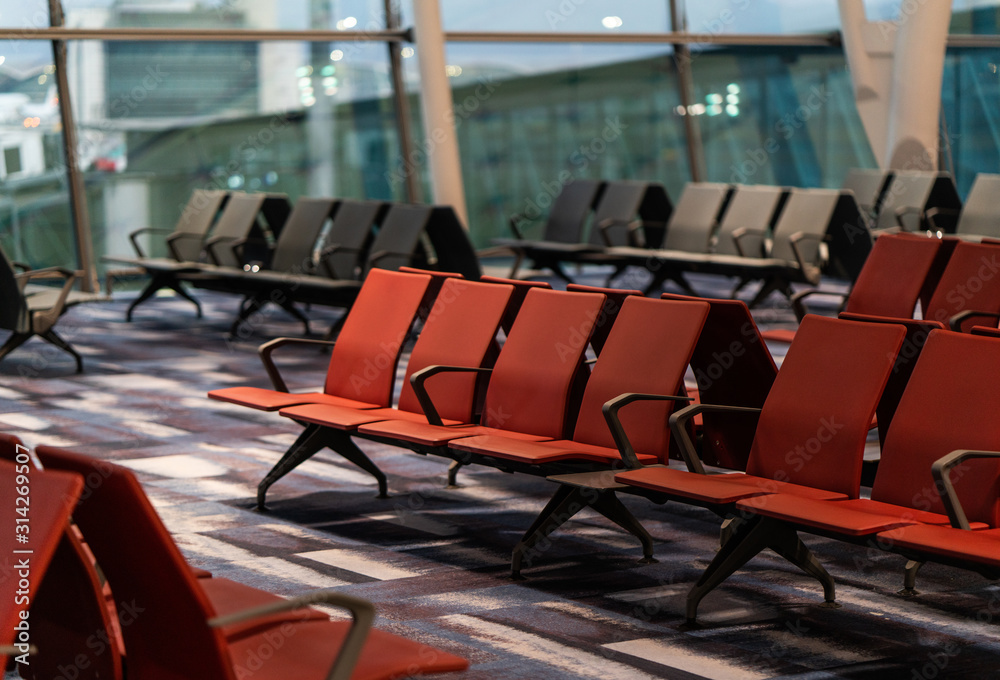 Chairs in modern airport terminal
