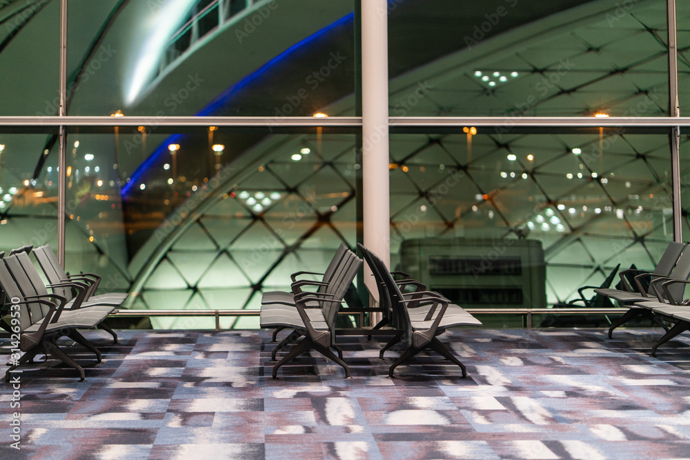 Chairs in modern airport terminal