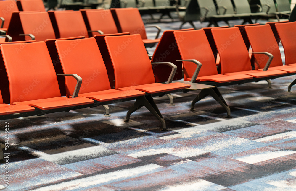 Chairs in modern airport terminal