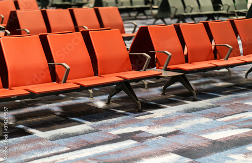 Chairs in modern airport terminal
