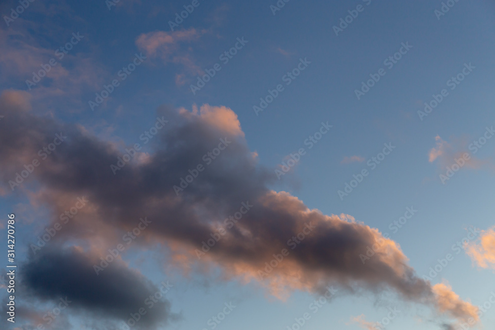 Fototapeta premium The sky is with clouds. Clouds have bright sunset colors. Moscow, Russia.