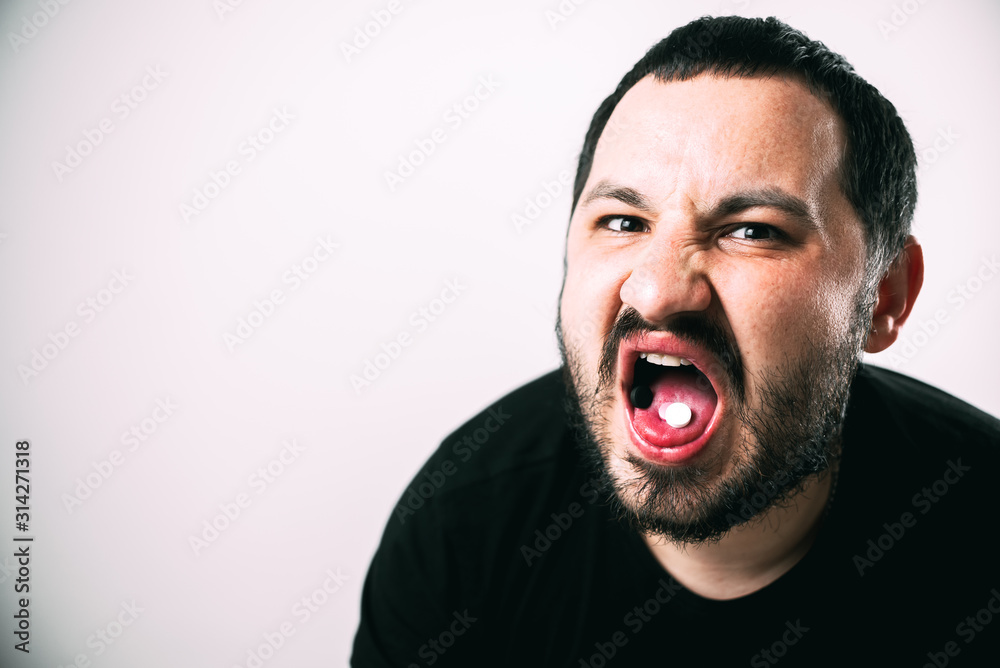 man close up in mouth pill screams like crazy man close up in mouth pill screams like crazy