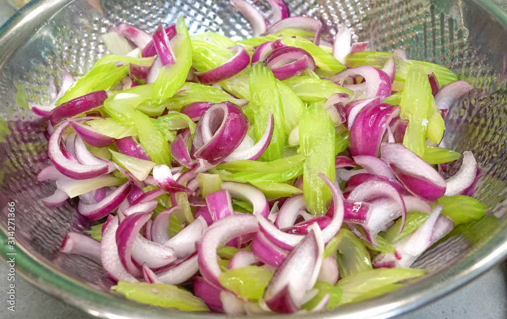 Onion and celery salad. Cooking healthy food.