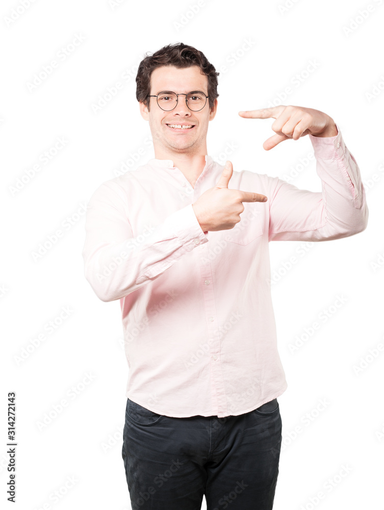 Friendly young man making a gesture of taking a photo with the hands Friendly young man making a gesture of taking a photo with the hands