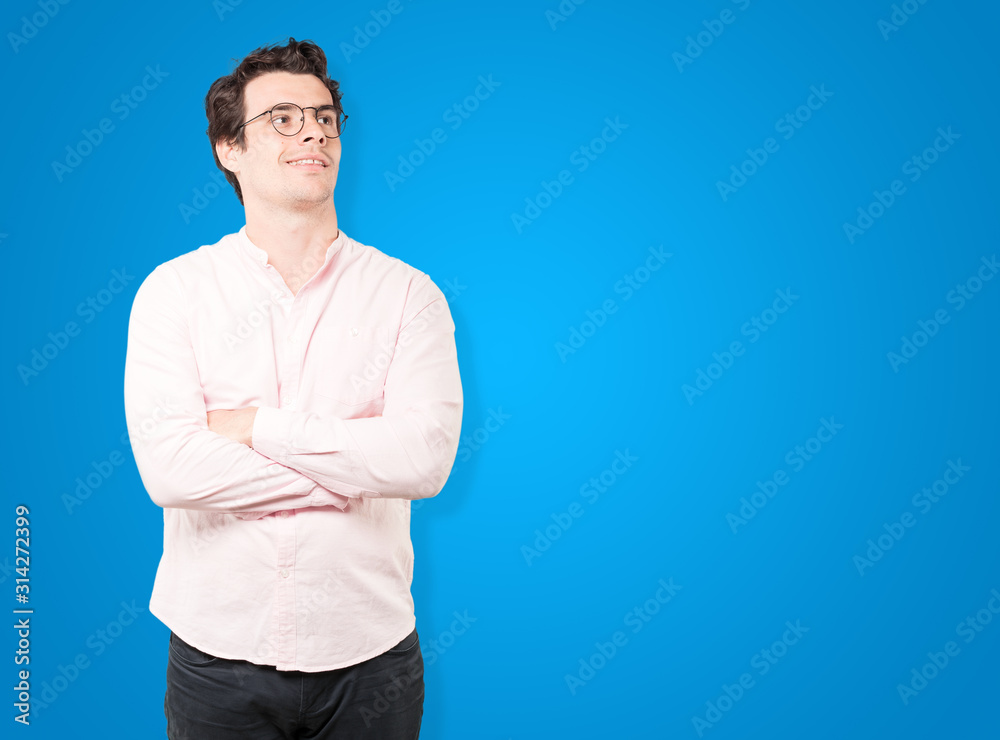 Happy young man looking up gesture Happy young man looking up gesture