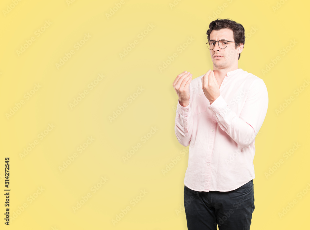Confused young man making an italian gesture of not understand Confused young man making an italian gesture of not understand