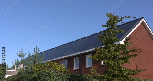 New-build residential houses with integrated solar roofs. EDE, THE NETHERLANDS - NOV 2019