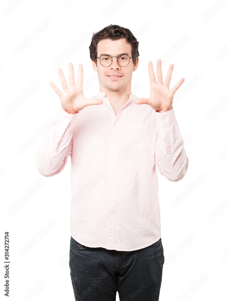 Young man making a number ten gesture Young man making a number ten gesture