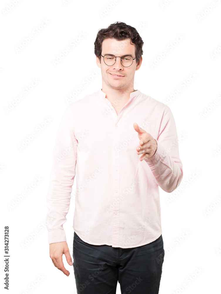 Young man waving with his hand Young man waving with his hand