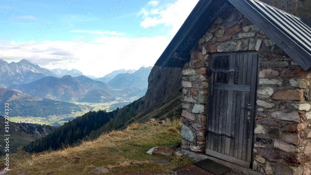 natural stone hut at the mountain top natural stone hut at the mountain top
