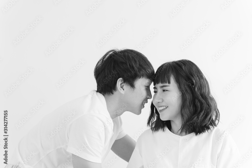 Sweet young asian couple falling in love. Love, valentine and wedding concept. Sweet young asian couple falling in love. Love, valentine and wedding concept.