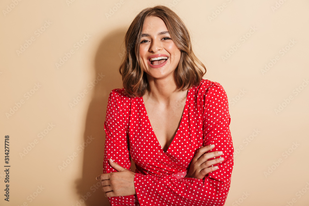 Beautiful young woman wearing red summer dress Beautiful young woman wearing red summer dress