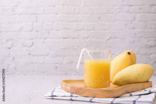 Table with Mangoes Juice.