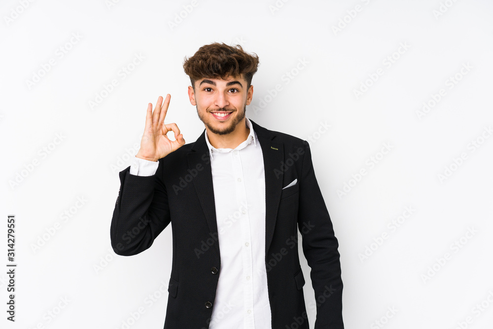 Young arabian business man isolated cheerful and confident showing ok gesture. Young arabian business man isolated cheerful and confident showing ok gesture.