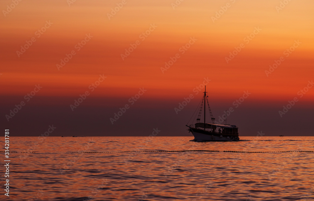 Boat. Sun. Orange. Sky. Sea. Istria
