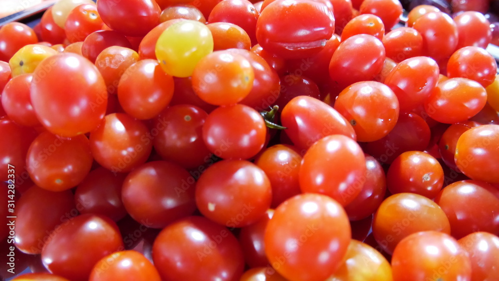 Colorful tomatoes on rustic Shallow depth Colorful tomatoes on rustic Shallow depth