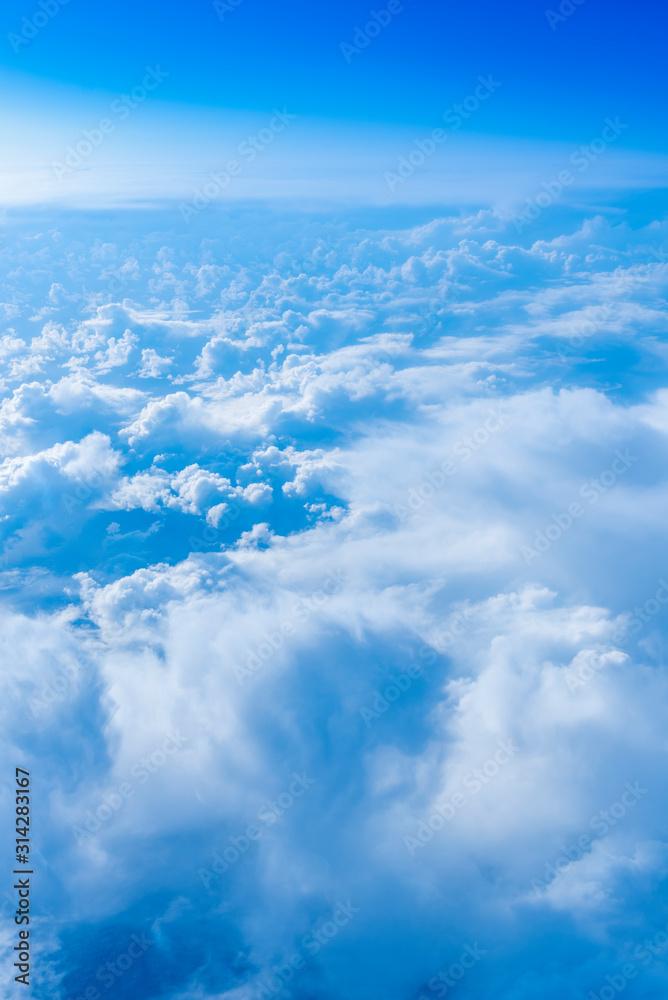 View from out of an airplane window at high altitude View from out of an airplane window at high altitude