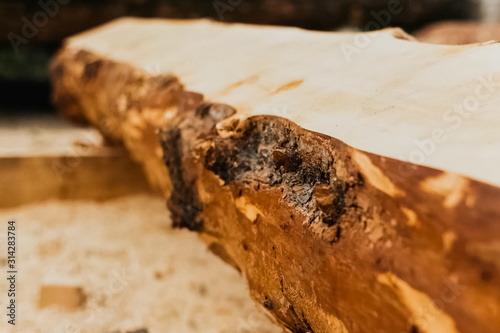 Photos uncut pine log. Building wood materials.
