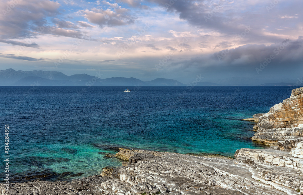 Wonderful summer seascape of Ionian Sea. Wonderful  place for holiday. Amazing Greece. Picturesque colorful in Kefalonia island. Turquoise colored bay in Mediterranean sea. Amazing postcard.