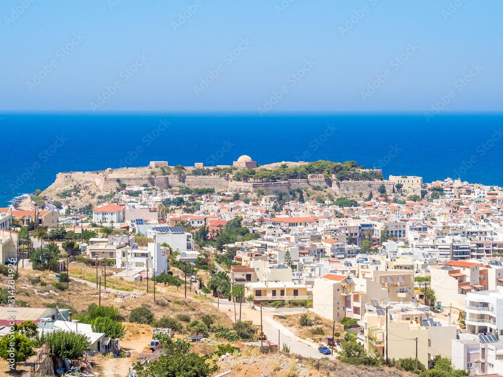 Crete island, Greece - Panorama of Rethymnon, Crete, Greece and The Venetian fortress Fortezza. It is the citadel of the city of Rethymno built by the Venetians in the 16th century.