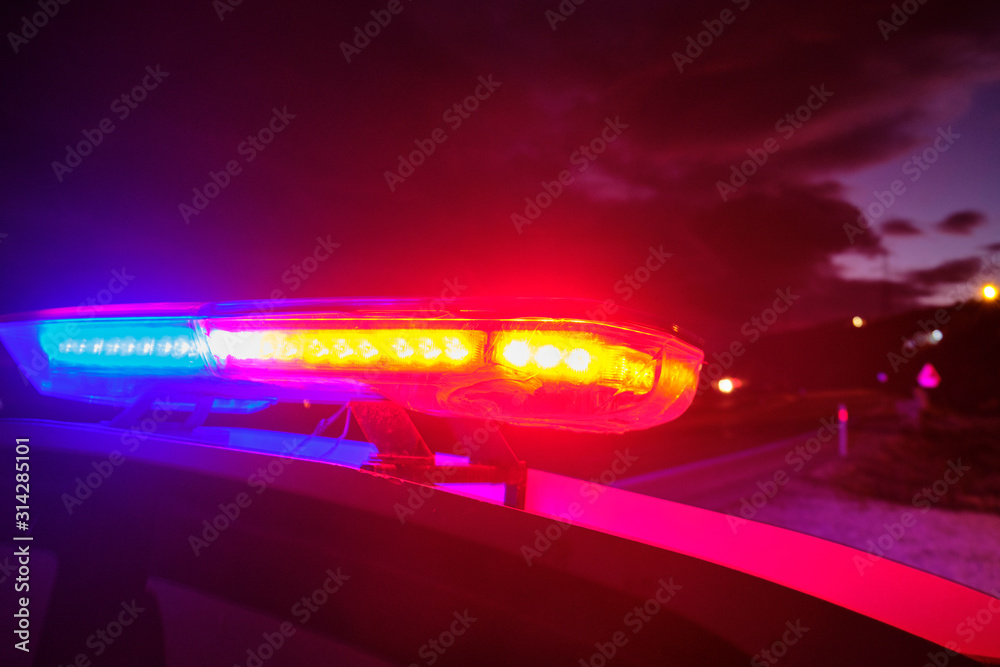 police car flashing lights in the night selective focus Stock Photo Adobe Stock