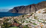 Santiago del Teide, Tenerife, Spain - December 23, 2019: Small resort of Los Gigantes known for the giant rock formations that go by the same name.
