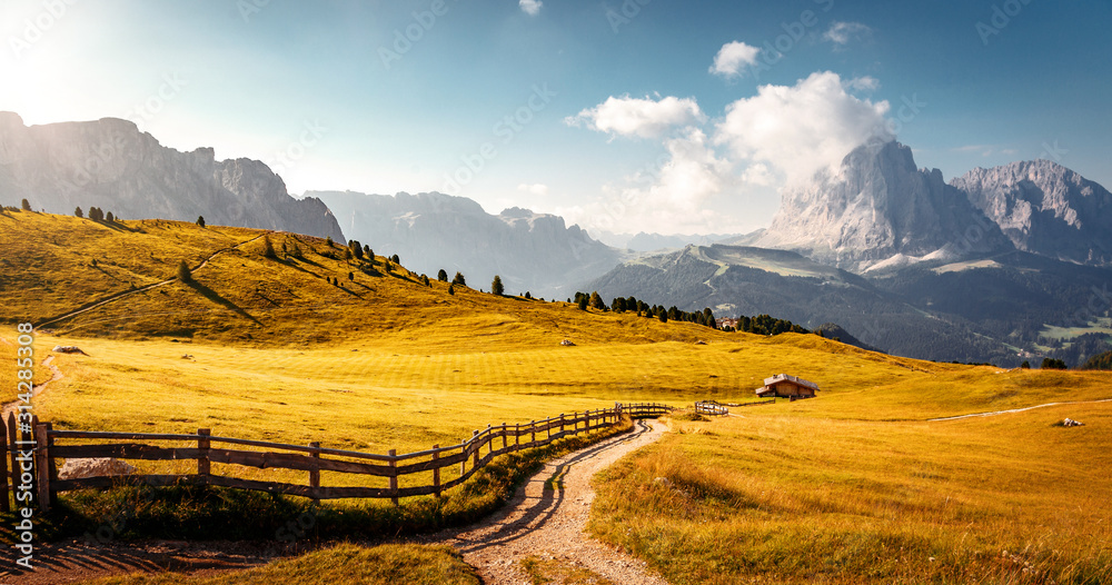 Fototapeta Dolomites, Italy Landscape at Passo Gardena with majestic Sella mountain group in northwestern Dolomites. Famous travel destination for adventure, trekking, hiking and outdoor activity.