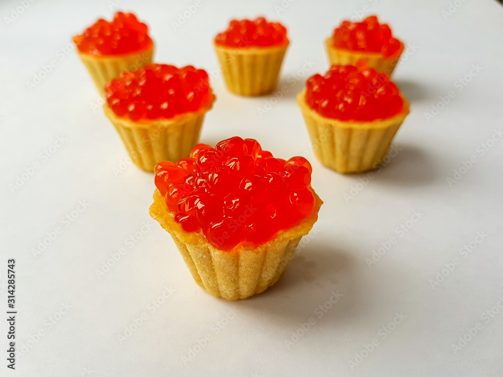 Tartlets with red salmon caviar. Snack, delicacy Tartlets with red salmon caviar. Snack, delicacy