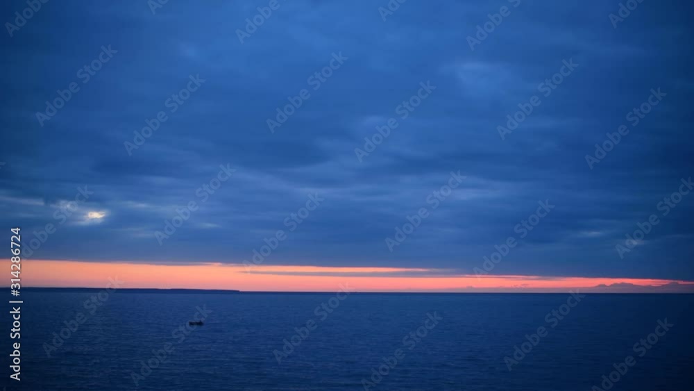 Peaceful and serene scene of small fishing boat off the coast of Elba Island at sunset. Chiessi. Peaceful and serene scene of small fishing boat off the coast of Elba Island at sunset. Chiessi.
