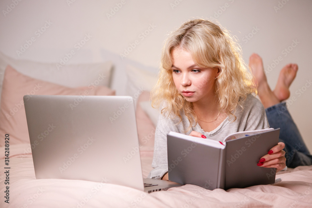 Smiling girl student study at home with laptop Smiling girl student study at home with laptop