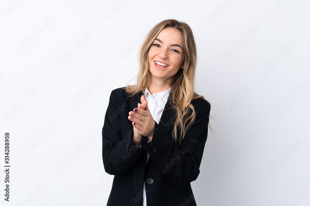 Young business woman over isolated white background applauding Young business woman over isolated white background applauding