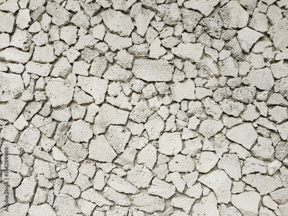 Texture of concrete in grey tone with cracked surface and dirt in cracks.old gray concrete wall for background. Concrete texture in white tone with very rough surface and large, deep cracks. Texture of concrete in grey tone with cracked surface and dirt in cracks.old gray concrete wall for background. Concrete texture in white tone with very rough surface and large, deep cracks.